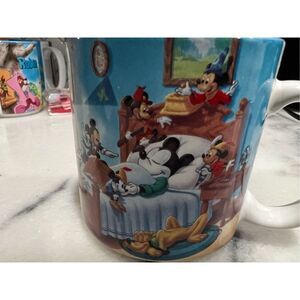 DISNEY MICKEY MOUSE THROUGH THE YEARS SLEEPING WITH PLUTO 3.5” TALL COFFEE MUG